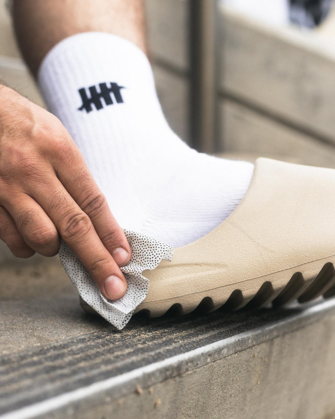 A look at the Yeezy slides on foot.